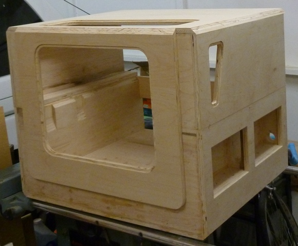 CNC cover resting on the base.